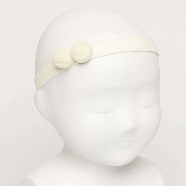 SIENA Čelenka krémová na gumu s brmbolcami Baby headband with two wooly pom poms cream